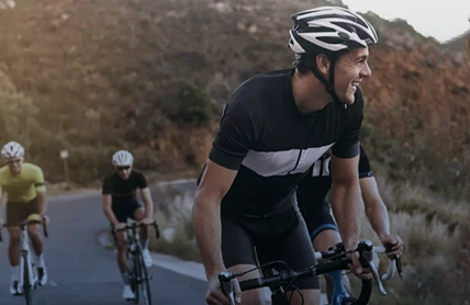 group of bikers in the road